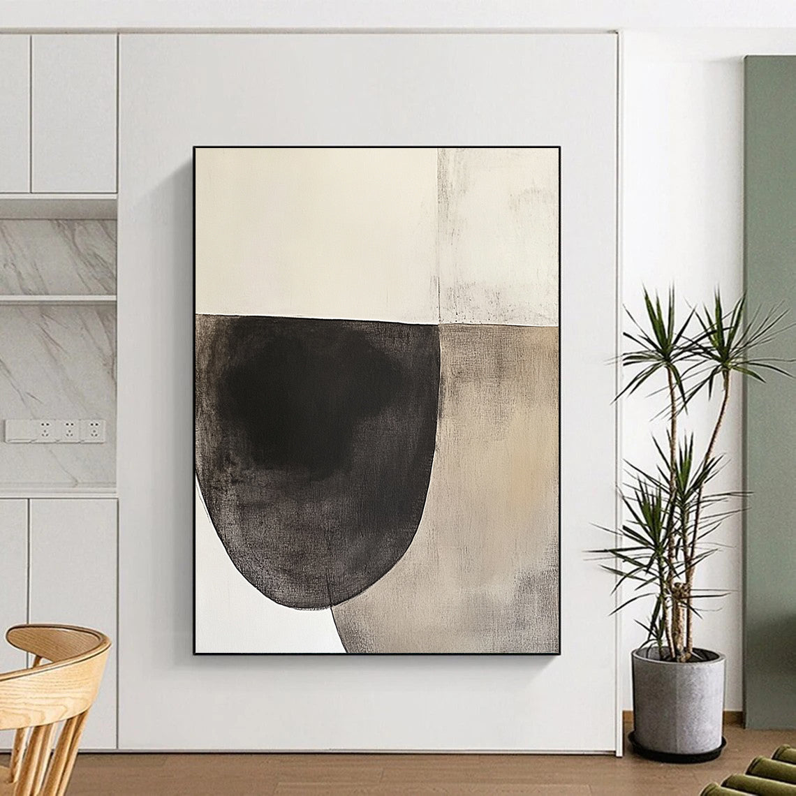 Contemporary hand-painted abstract artwork featuring an oval shape in dark charcoal and beige tones on textured white paper, inspired by minimalist design. DLZ0965
