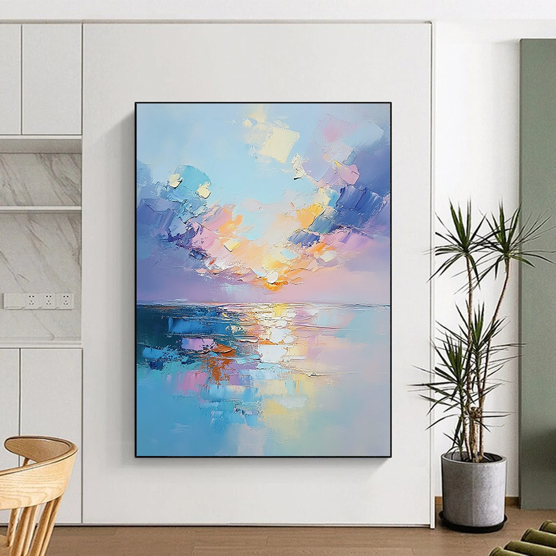Contemporary hand-painted abstract artwork capturing a serene sunset over the sea with textured clouds and soft reflections in pastel colors. DLZ1684