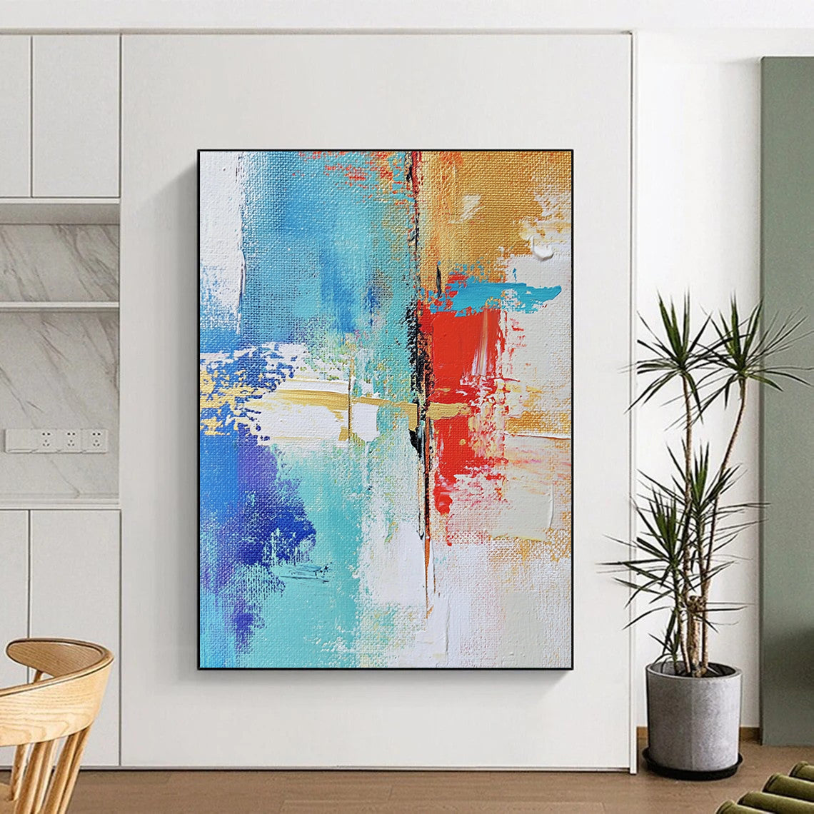 Contemporary hand-painted abstract art showcasing urban landscapes with textured brush strokes in soft neutrals and vibrant blue and red highlights DLZ0511
