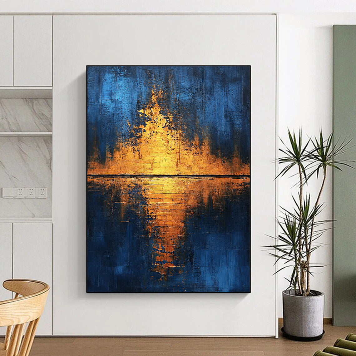 Contemporary hand-painted abstract art featuring golden light reflections on water with blue and gold hues enhanced by gold foil and textured canvas. DLZ0506