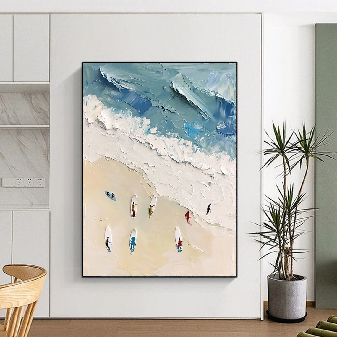 Large contemporary abstract artwork featuring vibrant acrylic colors capturing surfers in motion against a white sand beach backdrop in soft blues and greens. DLZ0842