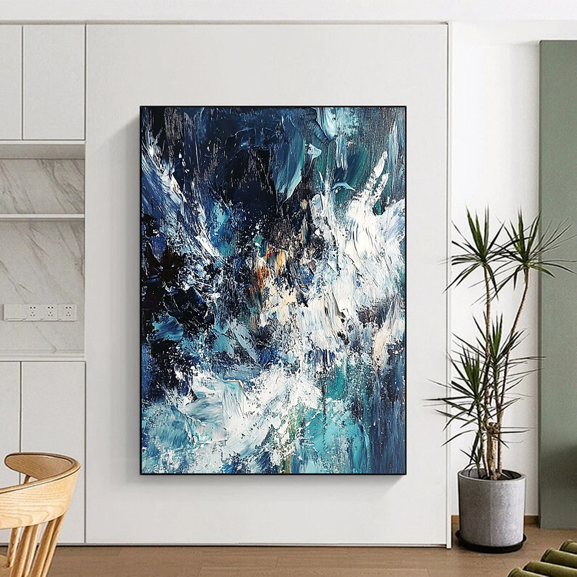 Contemporary abstract painting showcasing an ocean storm with dynamic blue and white waves using thick impasto strokes for dramatic texture and depth. DLZ0579
