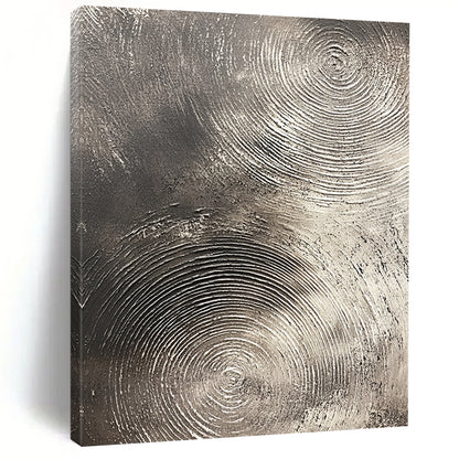 Contemporary abstract artwork features silver textures with swirling patterns on a dark gray background emphasizing depth and movement. DLZ1075