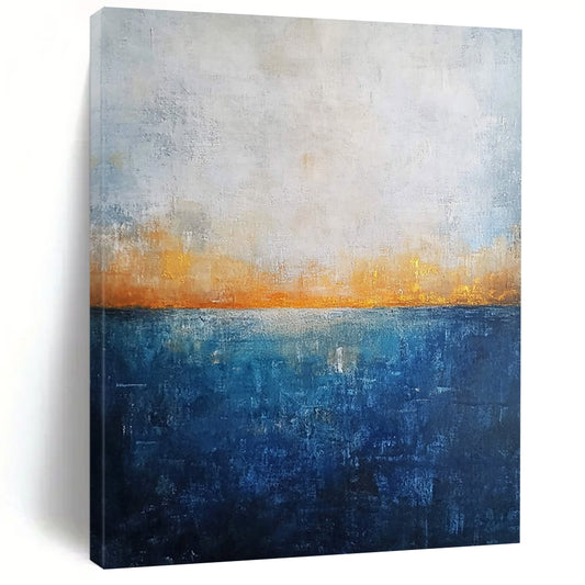 Contemporary abstract artwork featuring a deep blue ocean textured canvas with misty horizon neutral colors and elegant gold highlights. DLZ0468