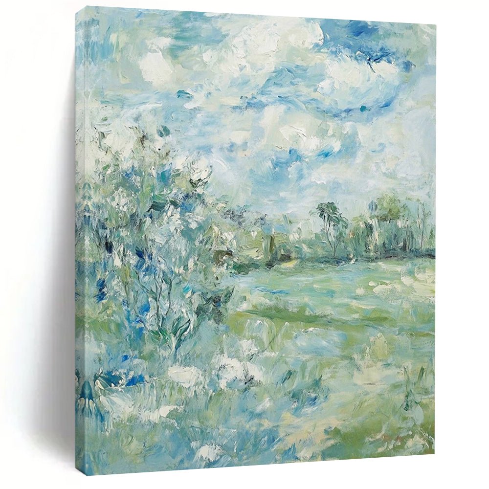 Contemporary hand-painted abstract art featuring soft clouds over serene trees and grass with a calming color palette of blue green and beige. DLZ1473