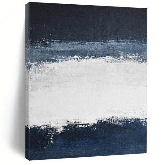 Large contemporary abstract painting featuring broad brush strokes in white and navy blue creating a tranquil atmosphere with a serene dark sky and soft gray clouds. DLZ0546