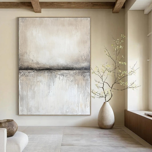 Contemporary abstract artwork features textured canvas in neutral gray and beige, with soft gradients and a central empty space showcasing subtle movement and light. DLZ0877