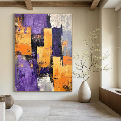 Contemporary abstract painting featuring a textured purple orange and grey cityscape with large buildings casting shadows across vibrant layers. DLZ0990