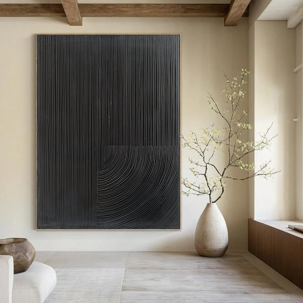 Contemporary abstract painting features half black with fine grooves and half gray abstract shape for a striking visual contrast. DLZ1553
