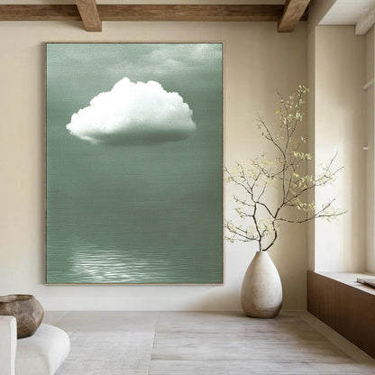 Contemporary abstract art features a soft white cloud on a gray backdrop, enhanced by green water ripples and subtle reflections below. DLZ1470