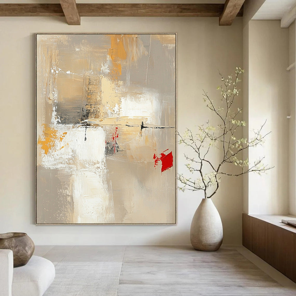 Contemporary hand-painted abstract artwork featuring neutral tones with red and yellow accents large white spaces and dynamic brush strokes and textures. DLZ0922