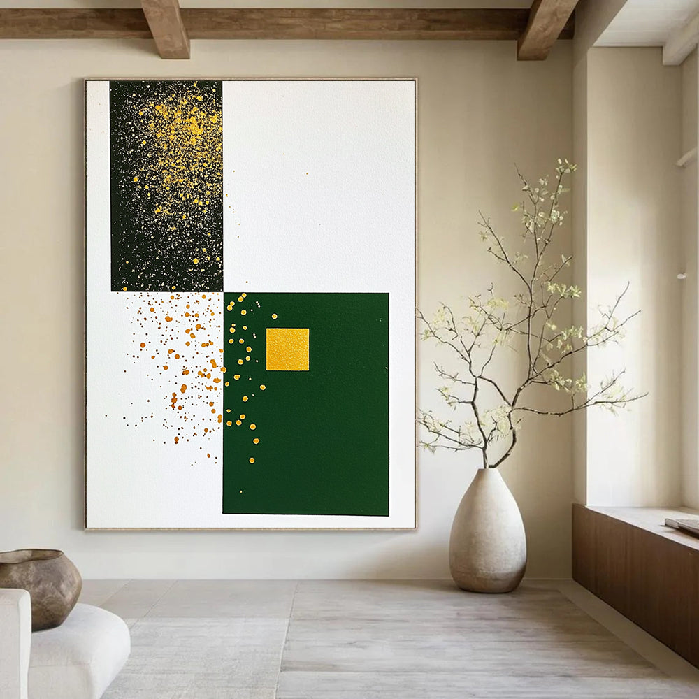 Contemporary abstract artwork featuring minimalist Japandi style with gold ink splatters on white paper and a dark green cardstock centerpiece. DLZ1613
