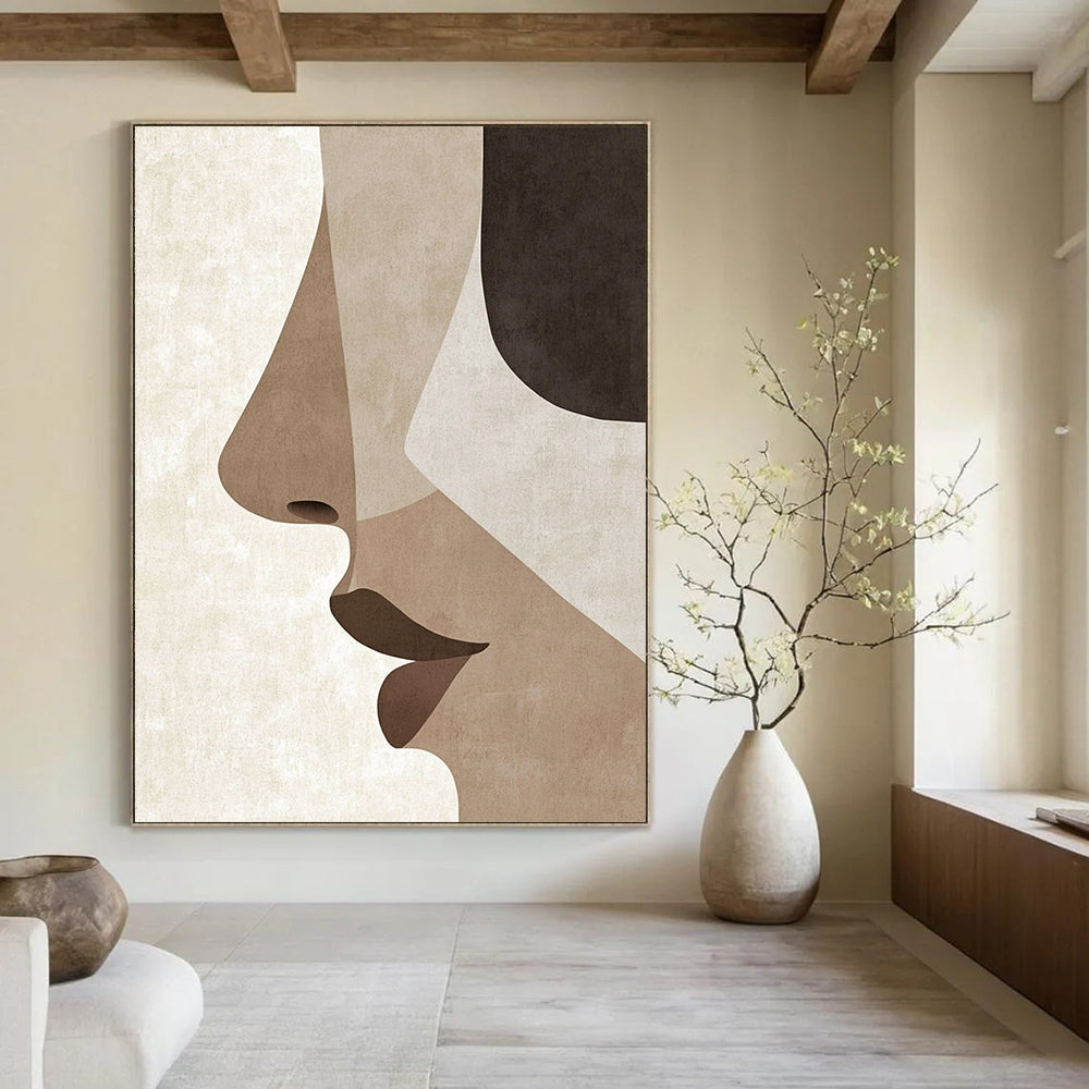 Contemporary hand-painted abstract art showcases minimalist Japandi style with simple facial features and a serene palette of earthy tones. DLZ1628