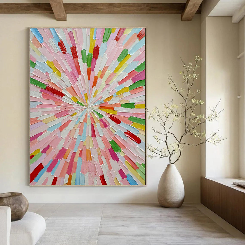 Large contemporary abstract artwork featuring vibrant colors in a sunburst pattern crafted from small paper sticks on a white background. DLZ1275