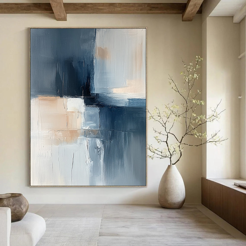 Contemporary hand-painted abstract artwork featuring soft blue gray and beige tones with layered shapes and a central dark element exuding calmness and minimalism. DLZ1052