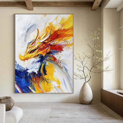 Contemporary abstract painting features an impasto technique with a powerful dragon soaring against a white background in vibrant yellows and blues. DLZ0525