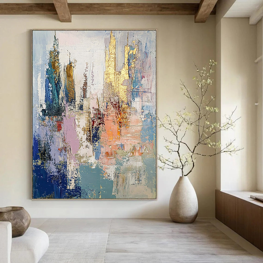 Contemporary abstract oil painting depicts an underwater city in muted pastels with gold leaf accents and thick brush strokes creating textured layers. DLZ0890