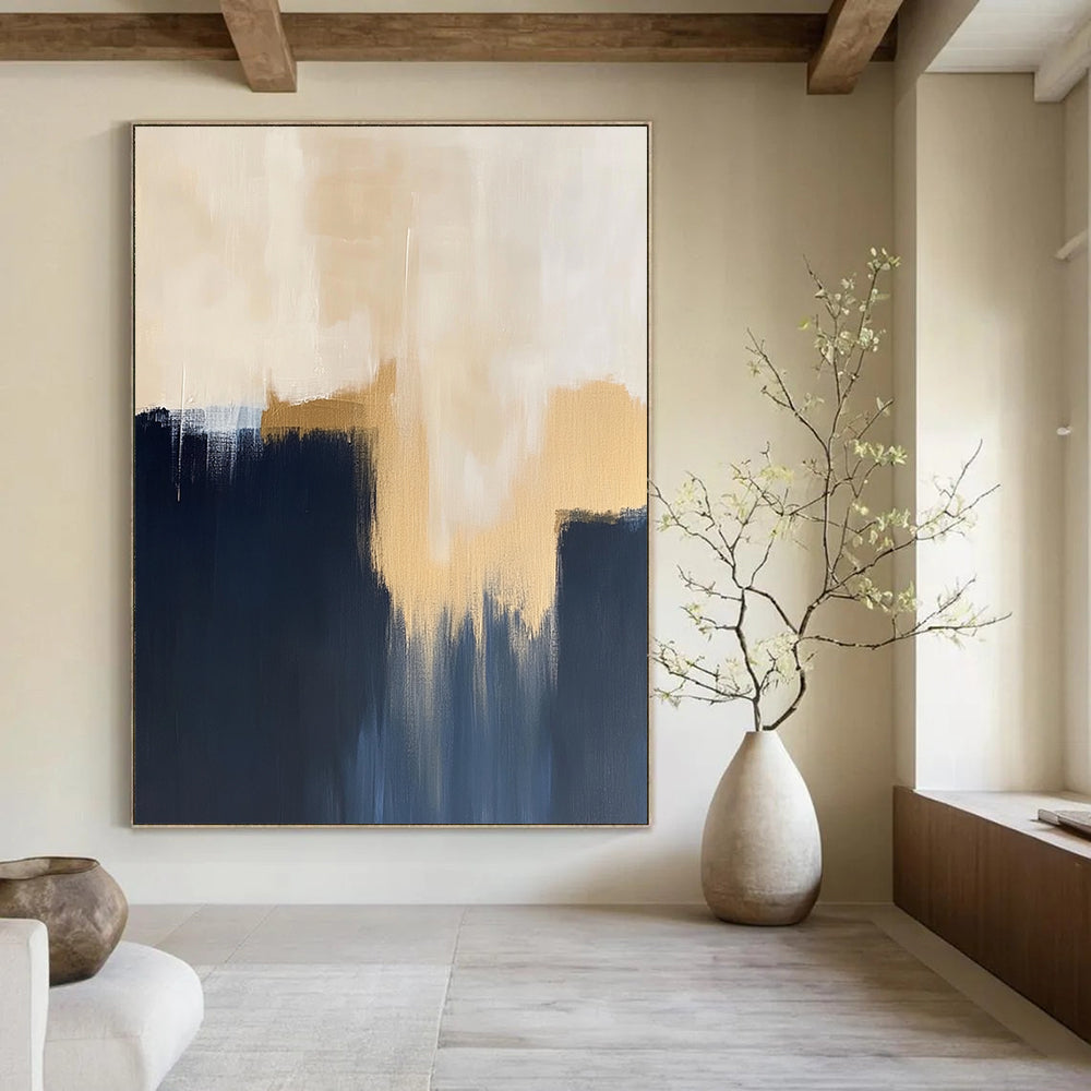 Contemporary hand-painted abstract artwork showcases minimalistic dark blue navy and beige hues with striking gold accents. DLZ0884