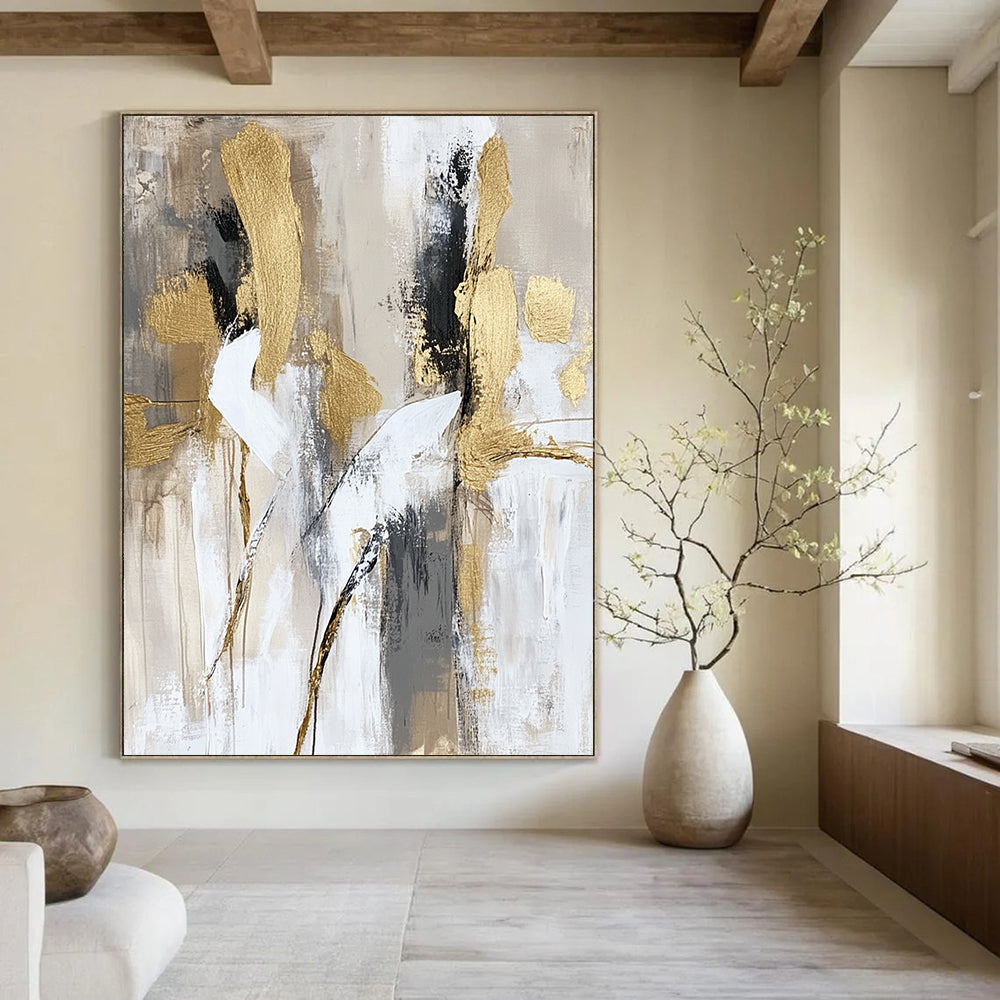 Contemporary hand-painted abstract art featuring soft brush strokes in neutral beige and white tones with elegant gold accents depicting dancing bodies in motion. DLZ0768
