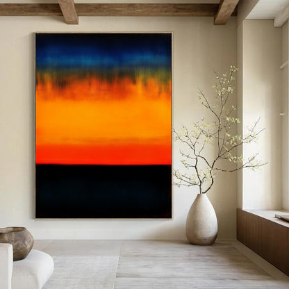 Contemporary hand-painted abstract art showcasing an orange and blue gradient sunset over the ocean with low contrast and dark colors for a blurred effect. DLZ0538