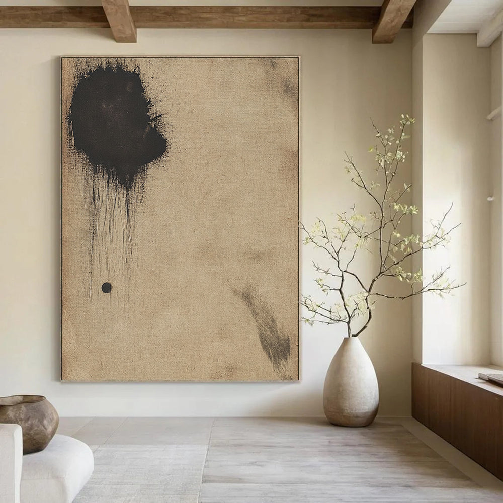 Contemporary hand-painted abstract art on antique beige paper featuring a small dark circle and a large black smudge for a striking visual impact. DLZ0678