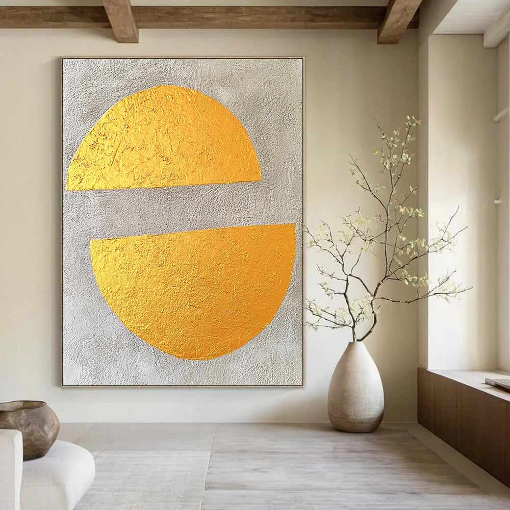 Contemporary abstract art featuring gold leaf on gray concrete with two large flat semicircles, creating a minimalist and striking visual experience. DLZ1579