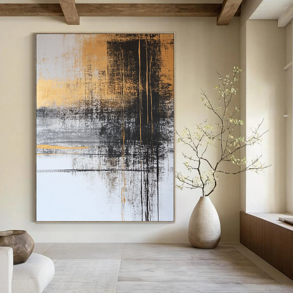 Contemporary abstract painting with gold and gray tones features black ink lines and serene water imagery, adorned with delicate plant figures for a tranquil feel. DLZ1273