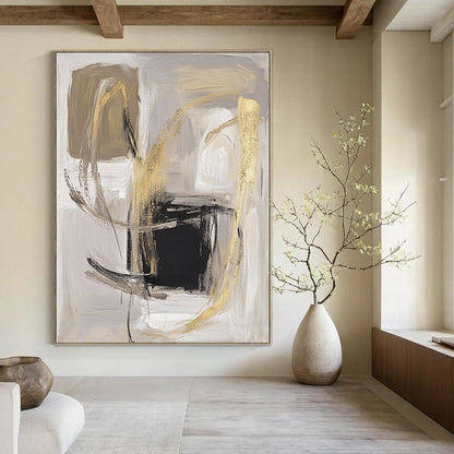 Contemporary abstract artwork featuring bold brush strokes in soft gray and beige with gold accents a minimalistic composition on a white background. DLZ0751