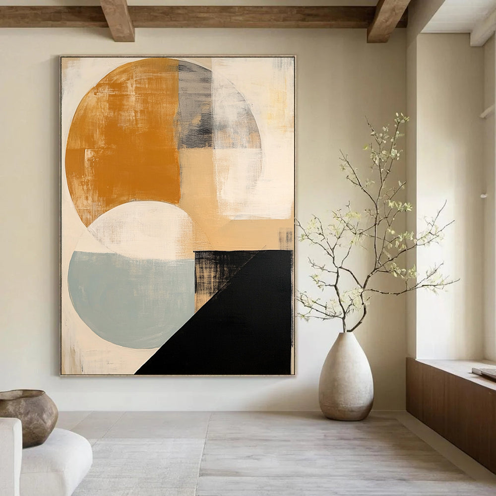 Contemporary hand-painted abstract artwork featuring soft beige black and white shapes a vibrant orange circle and subtle blue and grey accents. DLZ1038