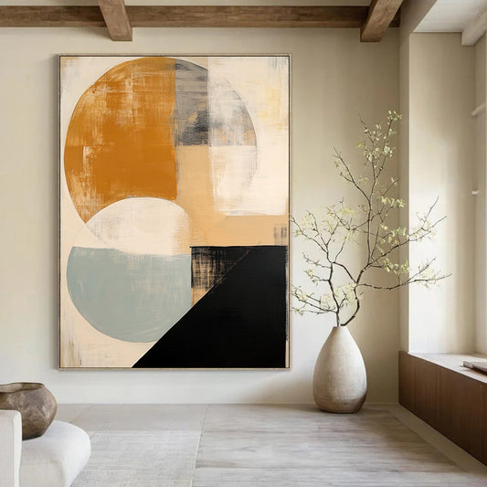 Contemporary hand-painted abstract artwork featuring soft beige black and white shapes a vibrant orange circle and subtle blue and grey accents. DLZ1038