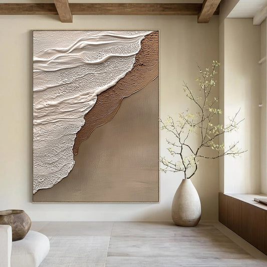 Contemporary hand-painted abstract art features beige and gray tones, evoking tranquility and harmony with a natural beach scene in the background. DLZ1212
