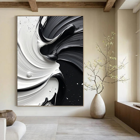 Large contemporary abstract painting featuring a dynamic swirl of white and black paint that enhances depth and elegance in any space. DLZ1476
