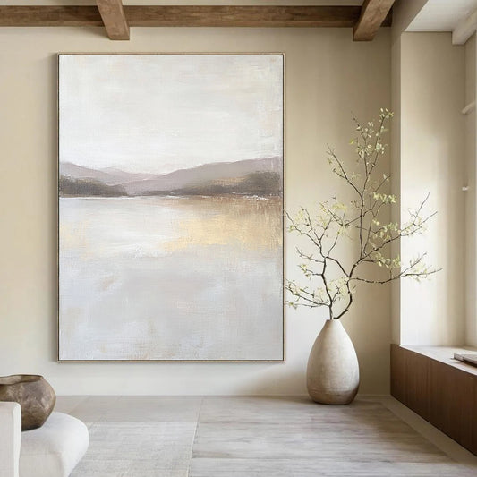 Contemporary abstract painting featuring a large lake in muted beige and gray tones with textured canvas and distant hills in the background. DLZ0415