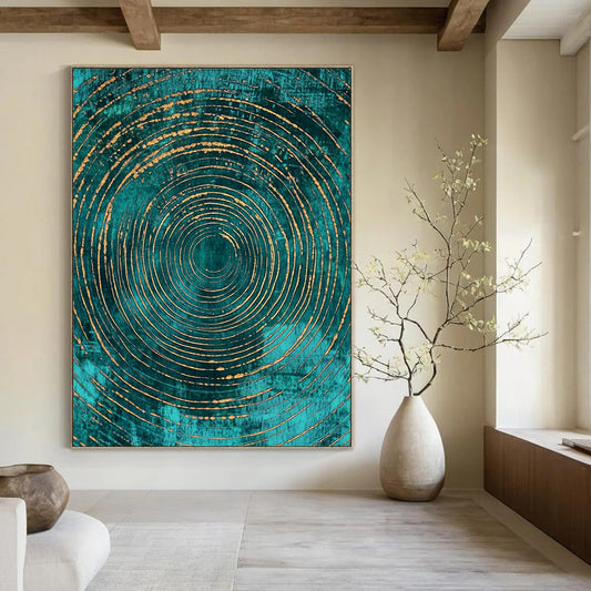 Contemporary art features abstract pattern with teal and gold concentric circles on a dark turquoise background, adding elegance to any space. DLZ1483