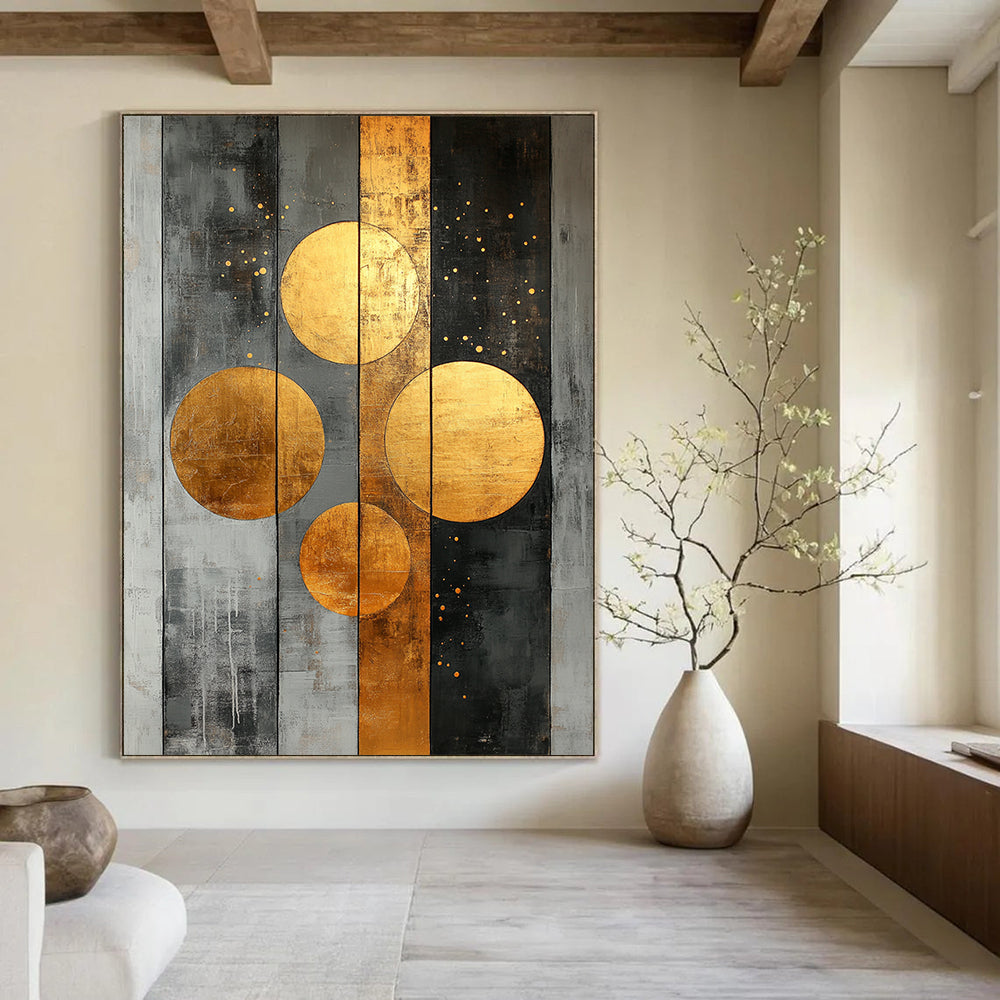Contemporary abstract artwork features striking gold circles on a textured grey canvas adorned with dynamic stripes and dots for a bold statement. DLZ0740