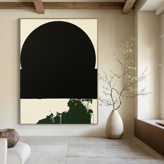 Contemporary hand-painted abstract art featuring a minimalist black circle with a white border and a small dark green splash on a black background. DLZ1382
