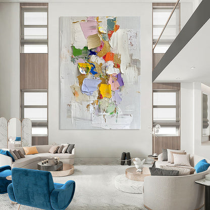 Contemporary abstract oil painting features gold leaf accents thick textures and vibrant colors on a white background with scattered colored paper pieces. DLZ0451