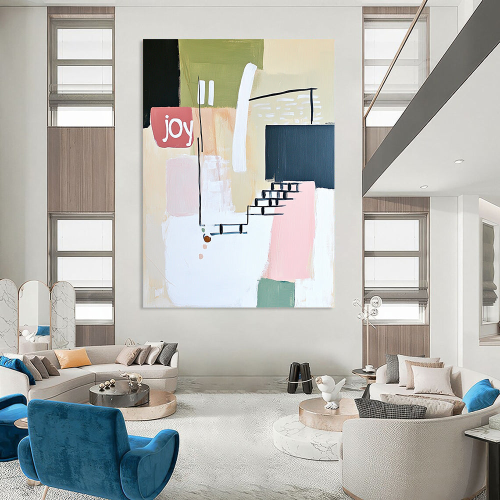 Contemporary abstract artwork features soft lines shapes and the word joy in white pale pink and green against a neutral background with a hint of staircase. DLZ1643