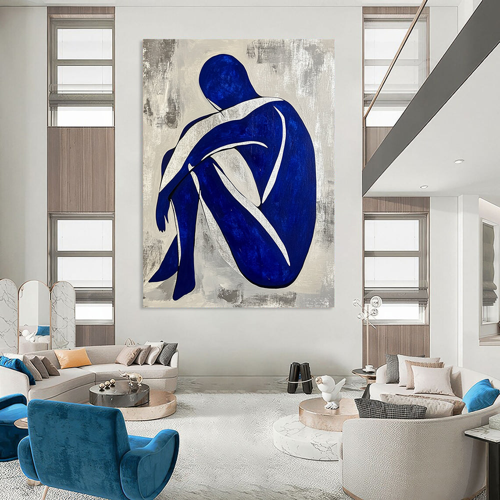 Contemporary hand-painted abstract artwork featuring a seated blue and white figure with a grey background and silver lines. DLZ0586