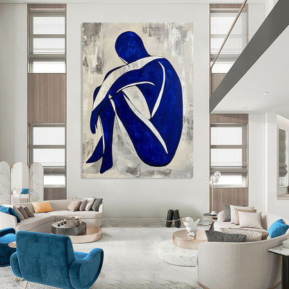 Contemporary hand-painted abstract artwork featuring a seated blue and white figure with a grey background and silver lines. DLZ0586