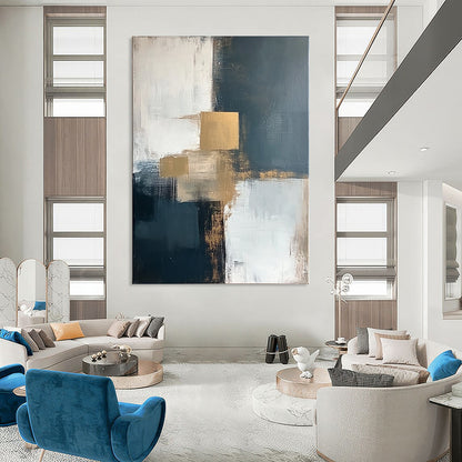 Contemporary abstract artwork featuring bold brush strokes in white, grey, beige, and blue with striking gold accents for a vibrant decor statement. DLZ0344