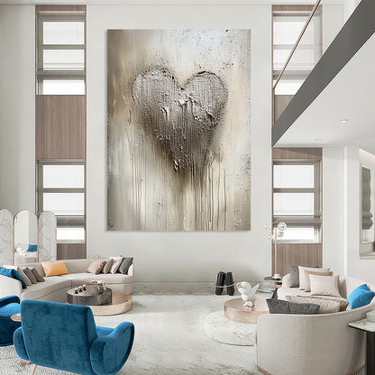 Contemporary abstract painting featuring textured silver and white patterns with a central heart shape, capturing winter's beauty in shimmering details and a cool palette. DLZ0531