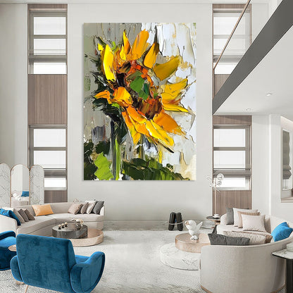 Vibrant abstract sunflower oil painting with bold brush strokes and textured surface in natural light against a soft green leaf backdrop. DLZ1664