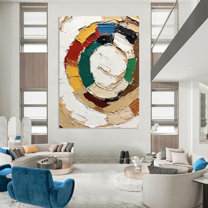 Contemporary abstract painting featuring the Olympic symbol with textured strokes and vibrant accents conveying a joyful expression in neutral colors. DLZ0654