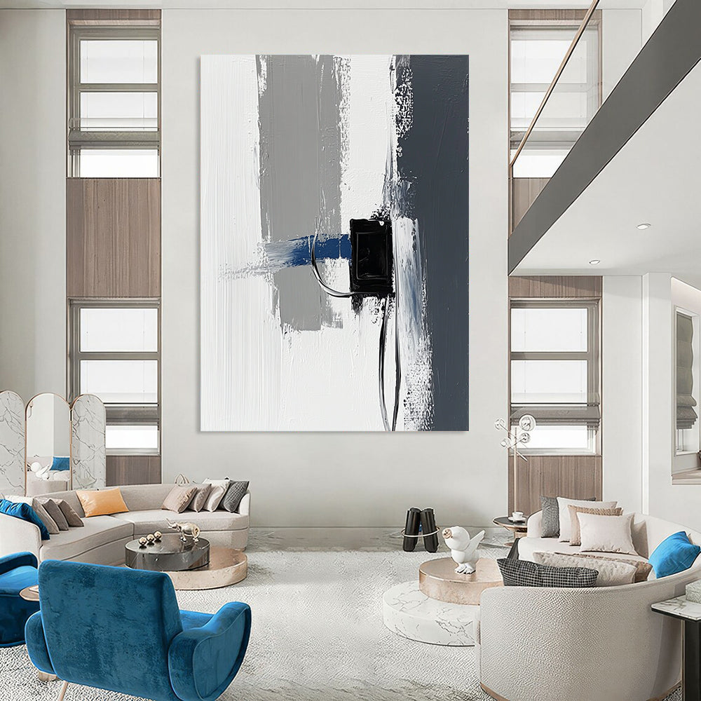 Contemporary abstract painting featuring impasto technique with thick gray and white strokes accented by blue details against a minimalist black power strip backdrop. DLZ1348