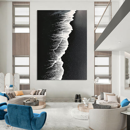 Contemporary abstract artwork capturing high-contrast monochrome beach waves on dark sand with intricate details and surrealistic perspective. DLZ0841