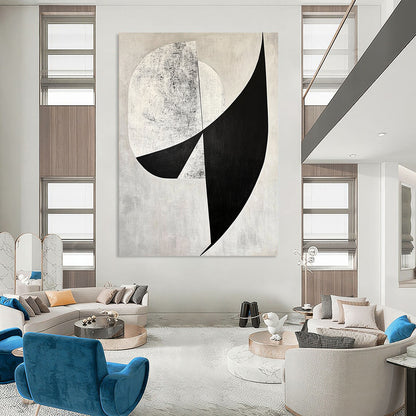 Contemporary abstract art features bold black and white shapes with diagonal cuts against a gray background and geometric figures adding depth. DLZ1400