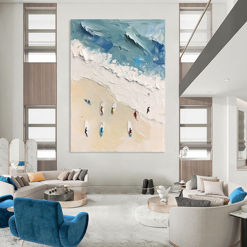 Large contemporary abstract artwork featuring vibrant acrylic colors capturing surfers in motion against a white sand beach backdrop in soft blues and greens. DLZ0842