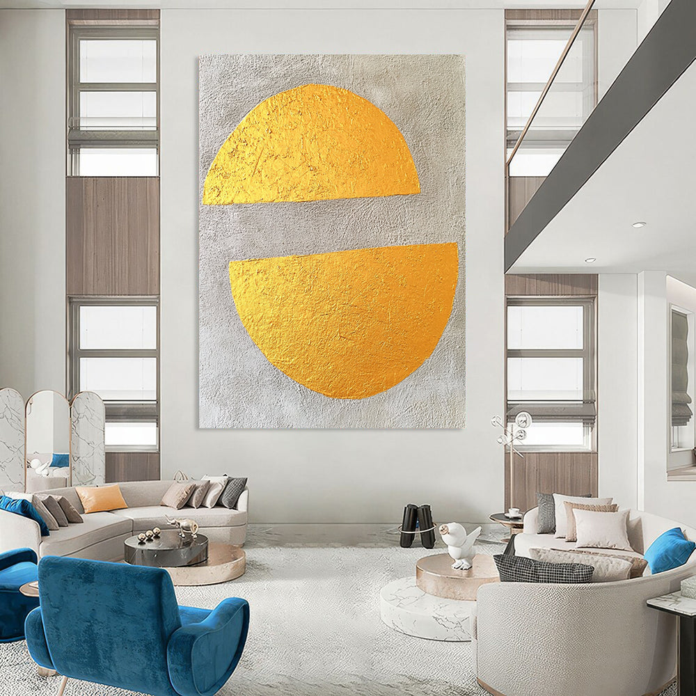 Contemporary abstract art featuring gold leaf on gray concrete with two large flat semicircles, creating a minimalist and striking visual experience. DLZ1579