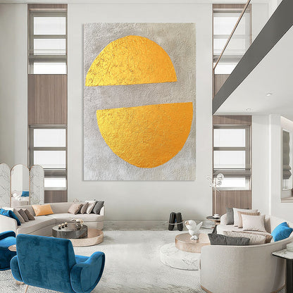 Contemporary abstract art featuring gold leaf on gray concrete with two large flat semicircles, creating a minimalist and striking visual experience. DLZ1579